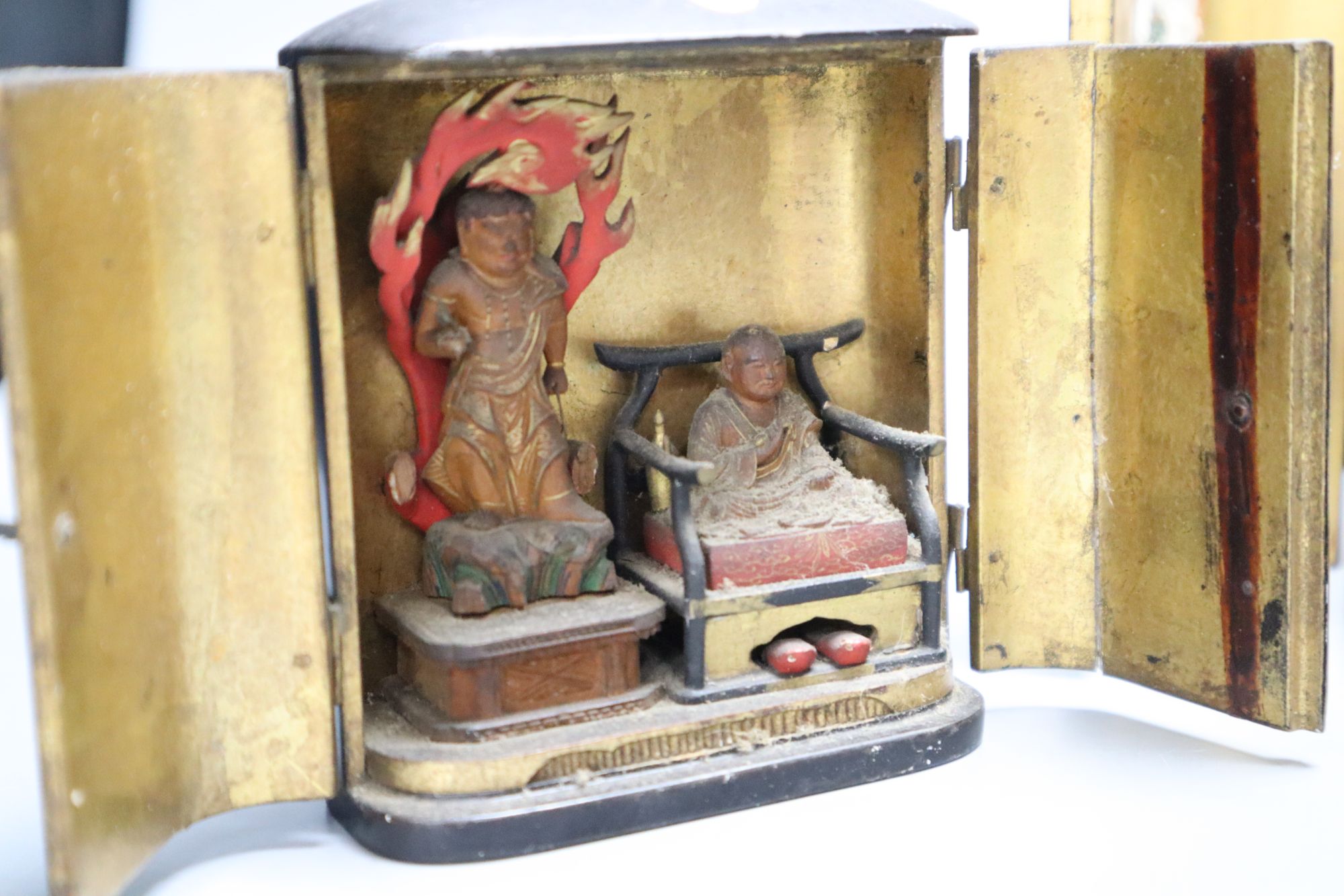 Three Japanese lacquer portable shrines (zushi), 19th century, tallest 15cm